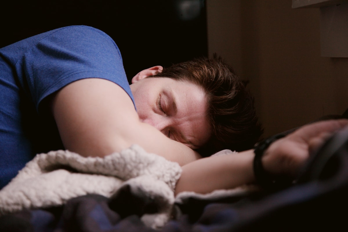 Woman waking up refreshed in morning light